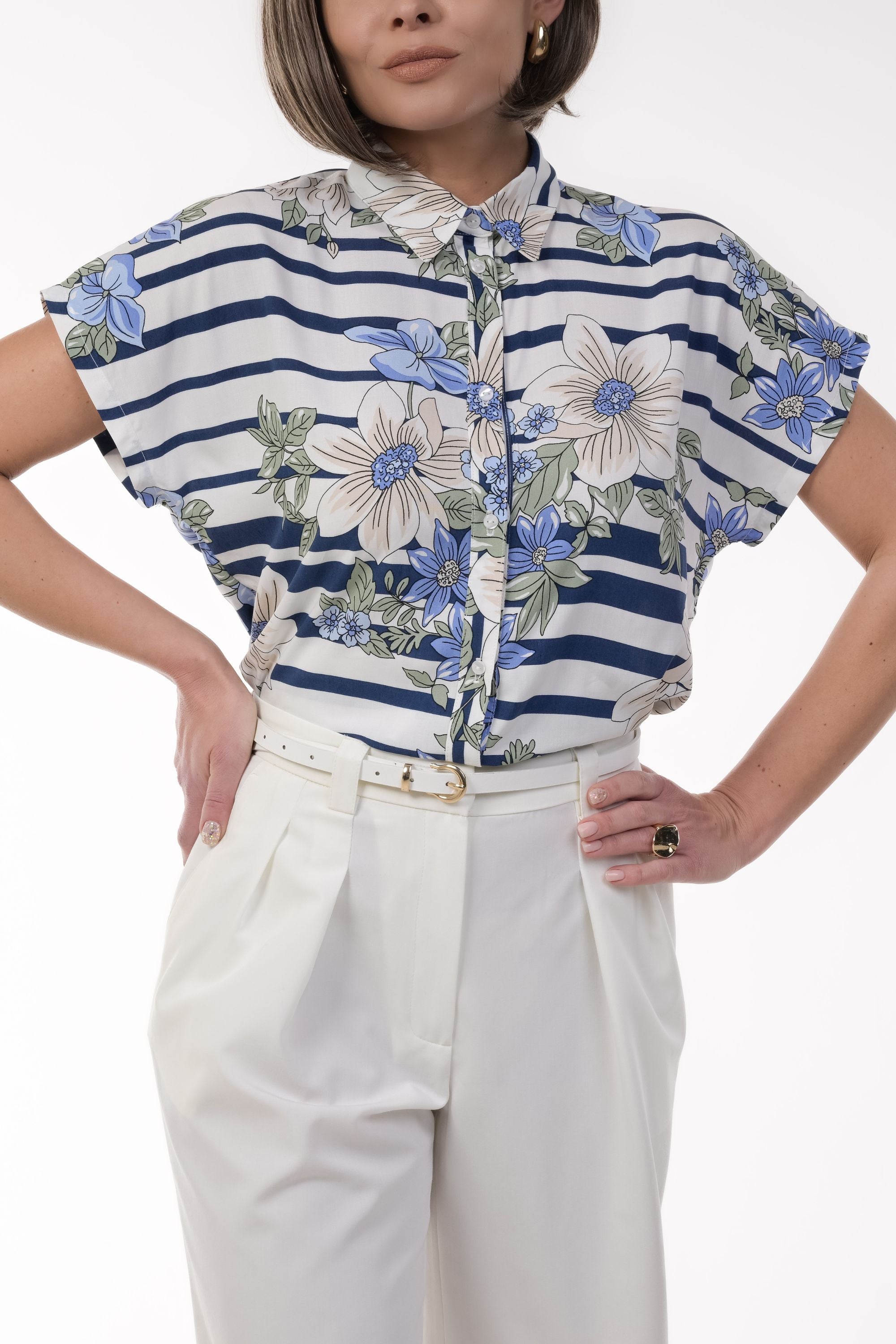 Sleeveless White Shirt With Blue Floral Design
